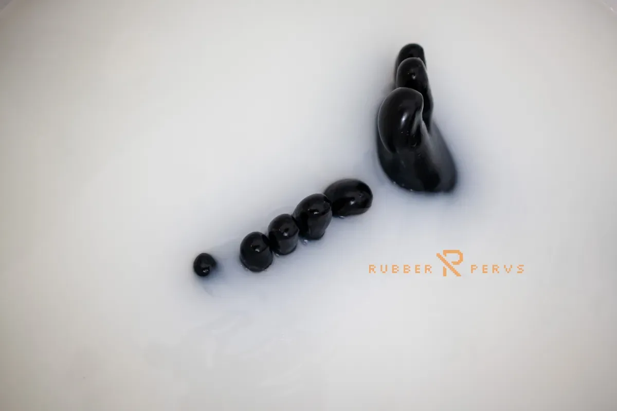 Rubber slut swallowing and bathing in milk - Rubber Pervs - 35499